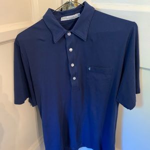 Criquet golf shirt. Navy blue. Never worn.
